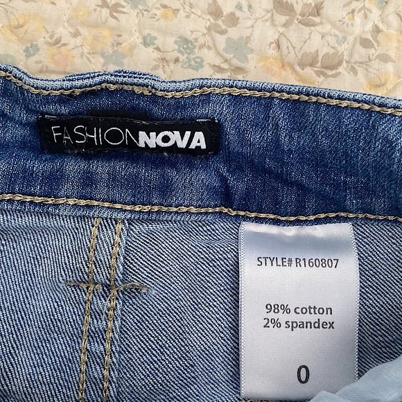 Fashion Nova • Mid-Wash High Rise Distressed Jeans💙 - Picture 9 of 11